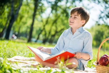 Boy in summer park