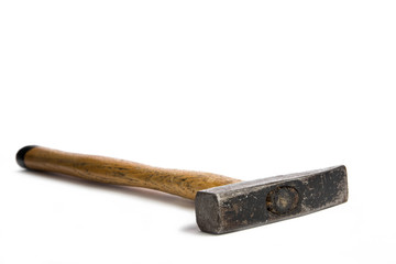 Pin hammer lying on white surface