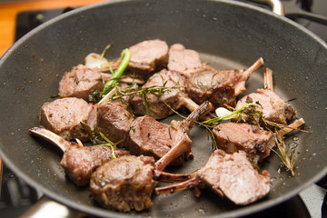 Lamb racks in a pan