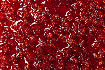 The texture of raspberry jam