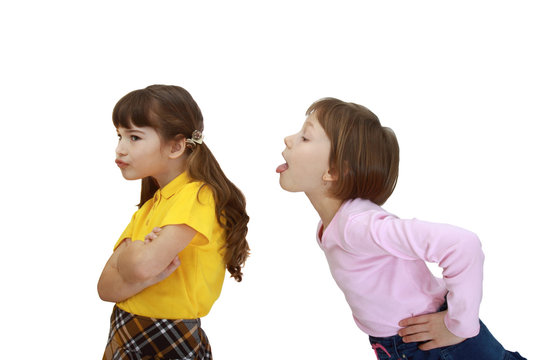 Two girls tease each other