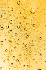 water drops on glass with gold