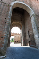 Fototapeta na wymiar Siena, Porta Romana. Tuscany, Italy