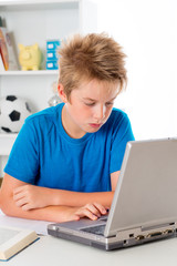boy is using computer