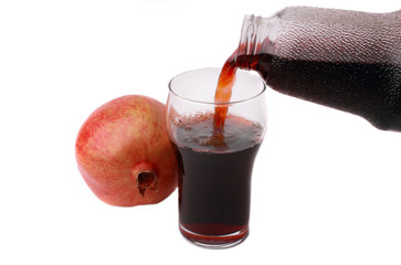 fresh pomegranate juice on a white background