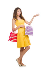 Woman after shopping spree on white