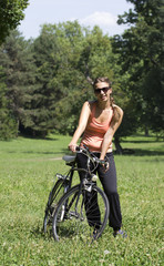 Girl with bicycle