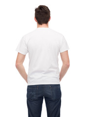 young man in blank white t-shirt from back