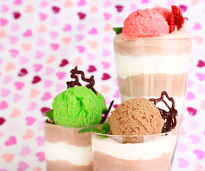 Tasty chocolate mousse with sorbet on bright background