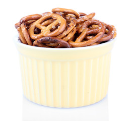 Dry breakfast in a small round bowl on white background