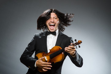 Man violin player in musican concept