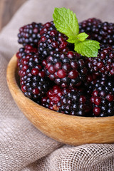 Wooden bowl of blueberries