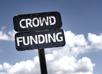 Crowd Funding sign with clouds and sky background