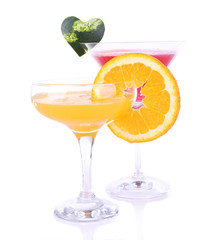 Watermelon and orange cocktails in glasses isolated on white