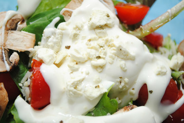 Close-Up of Creamy Dressing with Feta on Fresh Salad