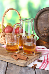 Still life with tasty apple cider and fresh apples,
