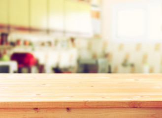 empty table board and defocused retro kitchen background