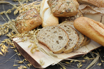 types of bread on a wooden table