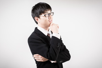 Successful young business man of Asian, full length portrait iso