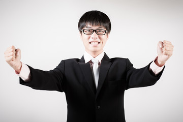 Successful young business man of Asian, full length portrait iso