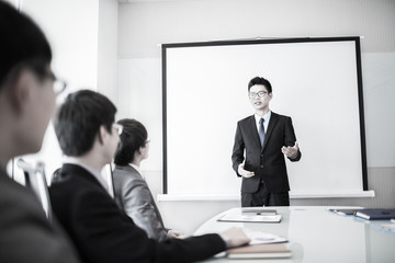 Fototapeta premium businessman giving a presentation to his colleagues