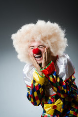 Funny clown in the studio