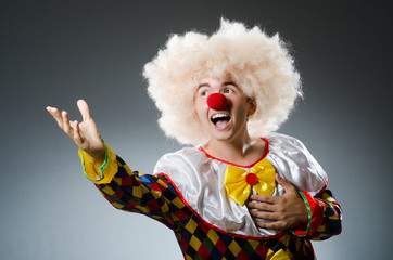 Funny clown in the studio