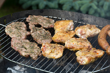 barbecue with delicious grilled meat on grill
