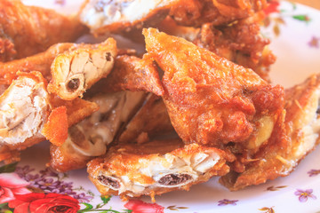 Fresh fried chicken on a plate set