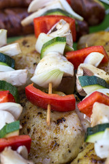 barbecue with delicious grilled meat and vegetables on grill