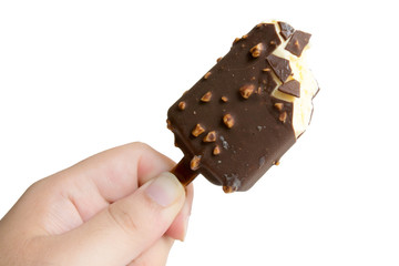 Hand holding bitten ice cream. Isolated on a white background