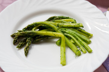 green asparaguses with the fresh dill