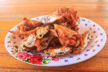 Fresh fried chicken on a plate set