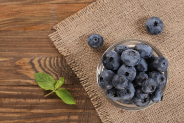 fresh blueberries on a background of burlap