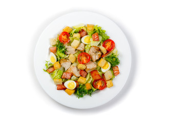 Plate with fresh ceasar salad isolated