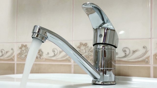 Bathroom faucet with running water