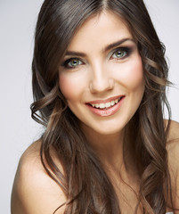 Naklejka premium Female model studio posing.Beauty smiling woman face portrait.