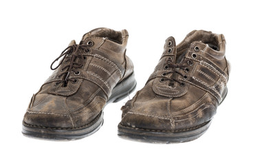 Old shoes isolated on white.