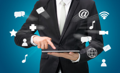 Businessman hand holding tablet cloud connectivity