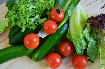 tomato and cucumber with many kind of salads