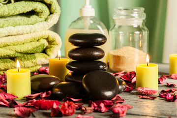 Spa still life with hot stones and candles