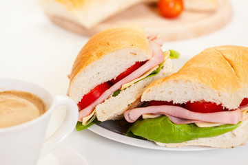 Panini sandwich with ham, cheese and tomato
