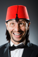 Man in traditional turkish hat and dress
