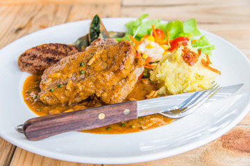 Image of beef steak and salad