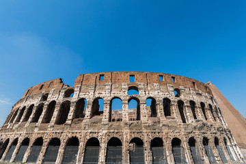 Fototapeta premium Famous colosseum on bright summer day
