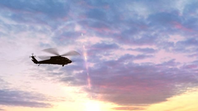 Black Hawk Helicopter Take Off silhouette in the sunse