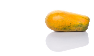 Papaya fruit over white background
