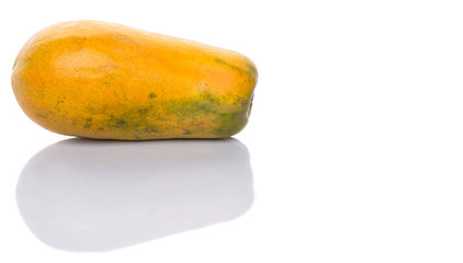 Papaya fruit over white background