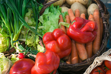 ripe vegetables in the basket with pepper