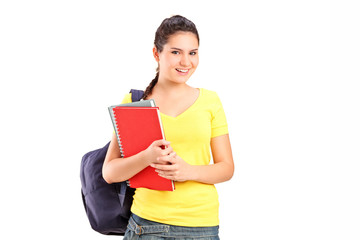 Schoolgirl holding books
